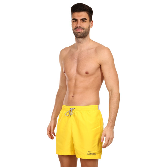 Pánske plavky Calvin Klein žlté (KM0KM00787 ZGR)