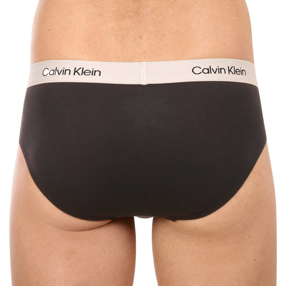 7PACK pánske slipy Calvin Klein čierné (NB3581A-CDB)