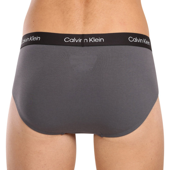 7PACK pánske slipy Calvin Klein viacfarebné (NB3581A-IUI)