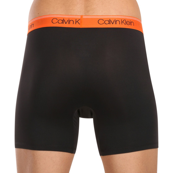 3PACK pánske boxerky Calvin Klein čierné (NB2570A-GTK)