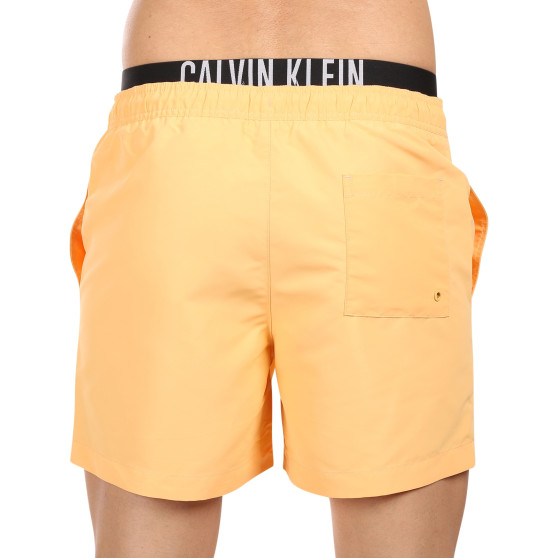 Pánske plavky Calvin Klein oranžové (KM0KM00992-SAN)